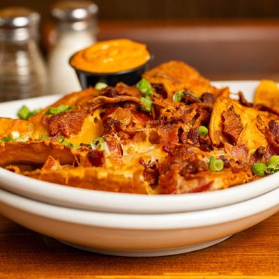 Loaded pub chips with a side of chipotle mayo.