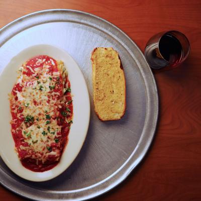 Baked Lasagna, served with garlic bread.