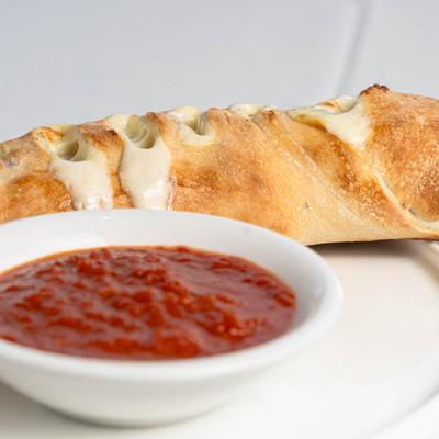 Stromboli, with marinara sauce.