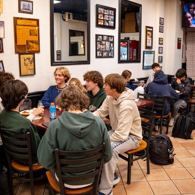 Guests sitting at the tables.