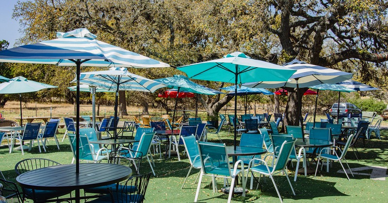 Exterior, seating and tables with parasols