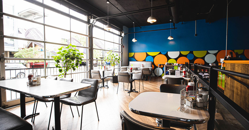 Interior, seating area with big windows on the left