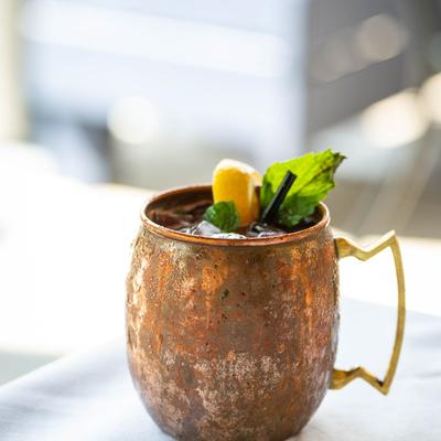 Winter Citrus Mule cocktail, in a copper mug