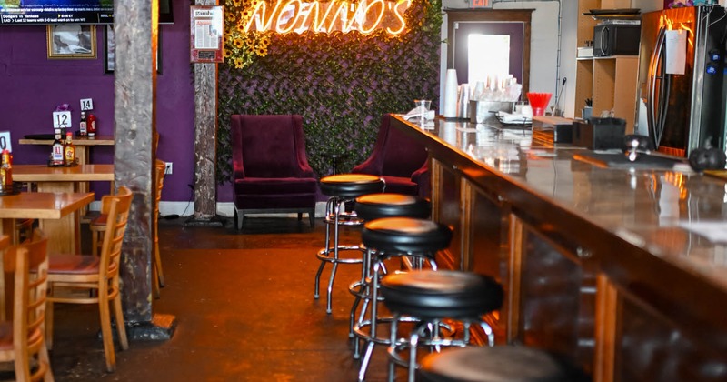 The serving counter and stools