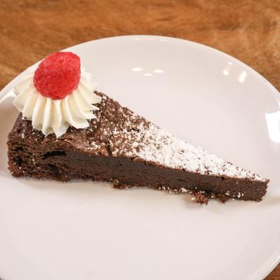 A slice of flourless chocolate torte.