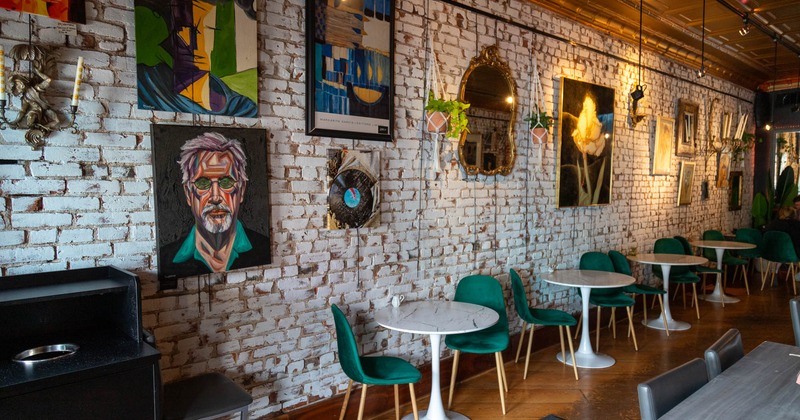 Interior, tables ready for guests, wall decorations