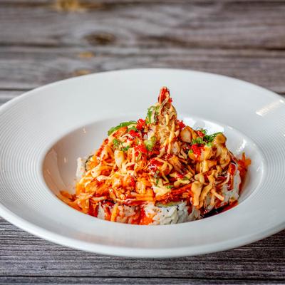 Grilled shrimp on a bed pf rice.