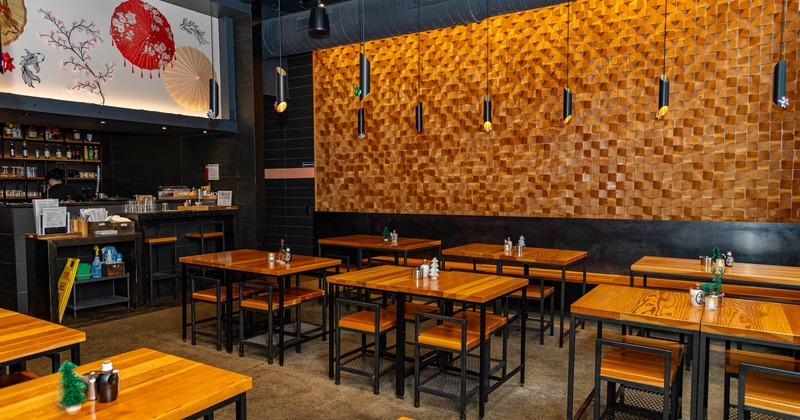 Interior, tables and chairs in seating area