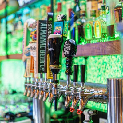 Beer taps at the bar.