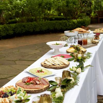 Various dishes set on table outside
