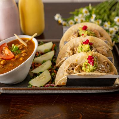 Malai Chicken Tikka Taco served with chickpeas soup.