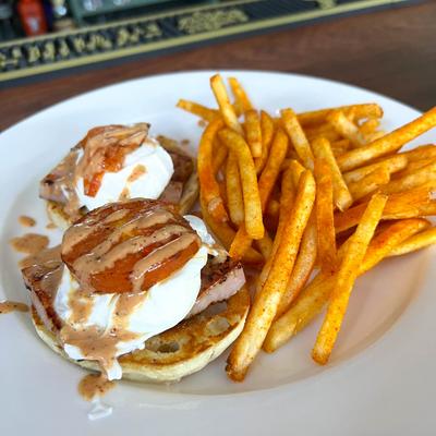 Eggs Benedict and fries.