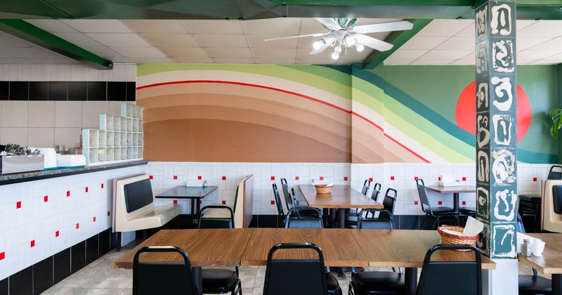 Interior, seating area with an ordering counter on the left