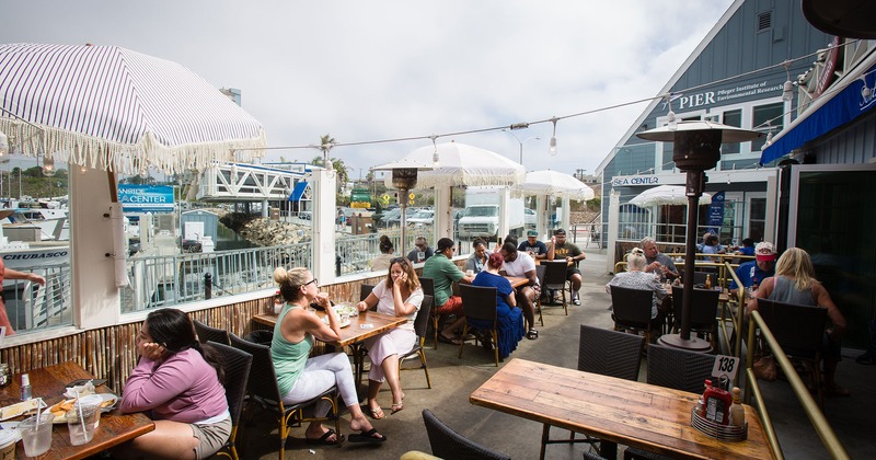 Exterior, dining area with lots of guests