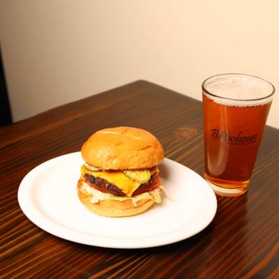 Cheeseburger with a beer.