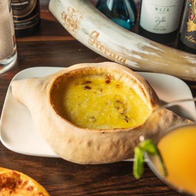 Georgian boat-shaped bread filled with molten cheese.