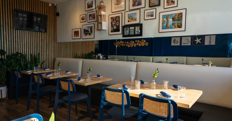 Interior, tables and chairs in dining area