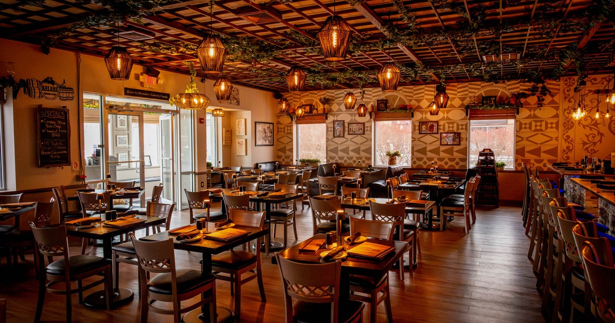 Interior, dining area, restaurant entrance, plant ceiling decoration, specials board