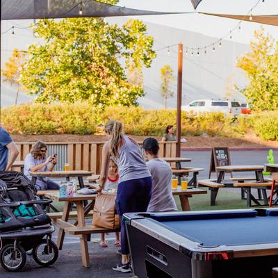 outdoor seating and pool table