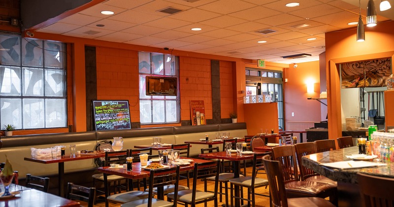Interior, tables and chairs ready for guests