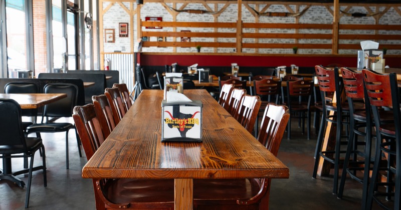 Interior, seating space with wooden tables and chairs