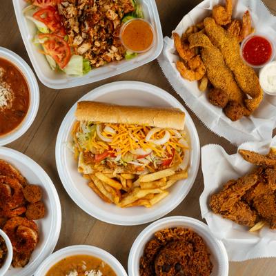 Assortment of menu items served on the table, overhead view.