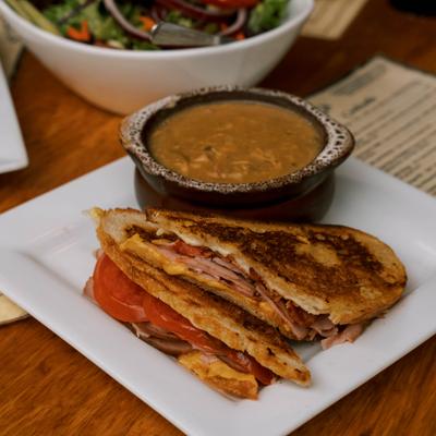 Grilled ham and cheese sandwich and soup.