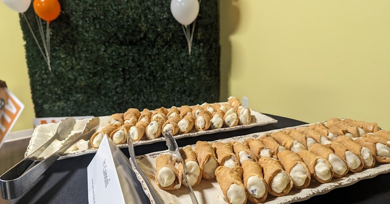 Two Cannoli trays on a table at a celebration