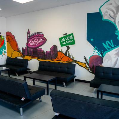 Interior, couches and wooden coffee tables.