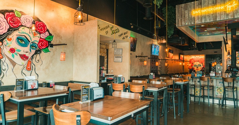 Interior, tables and chairs in dining area