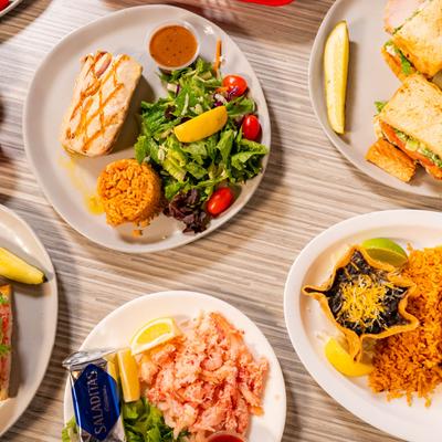 Different food dishes served on the table, top veiw.
