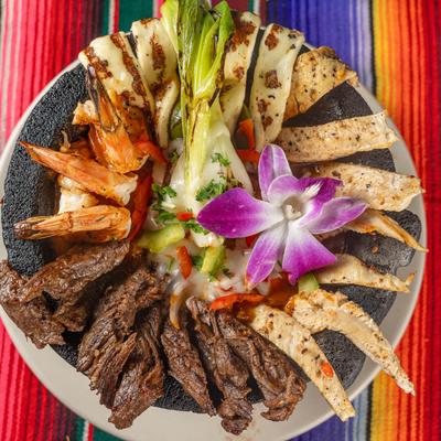 Molcajete, mixed grilled food.