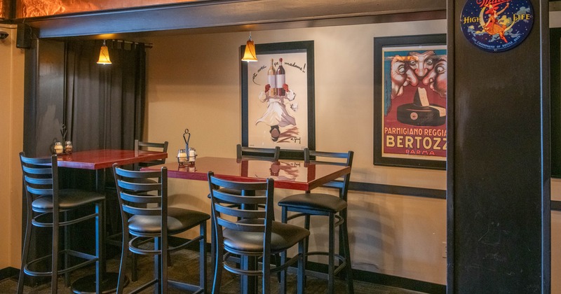 Two tables with bar stools
