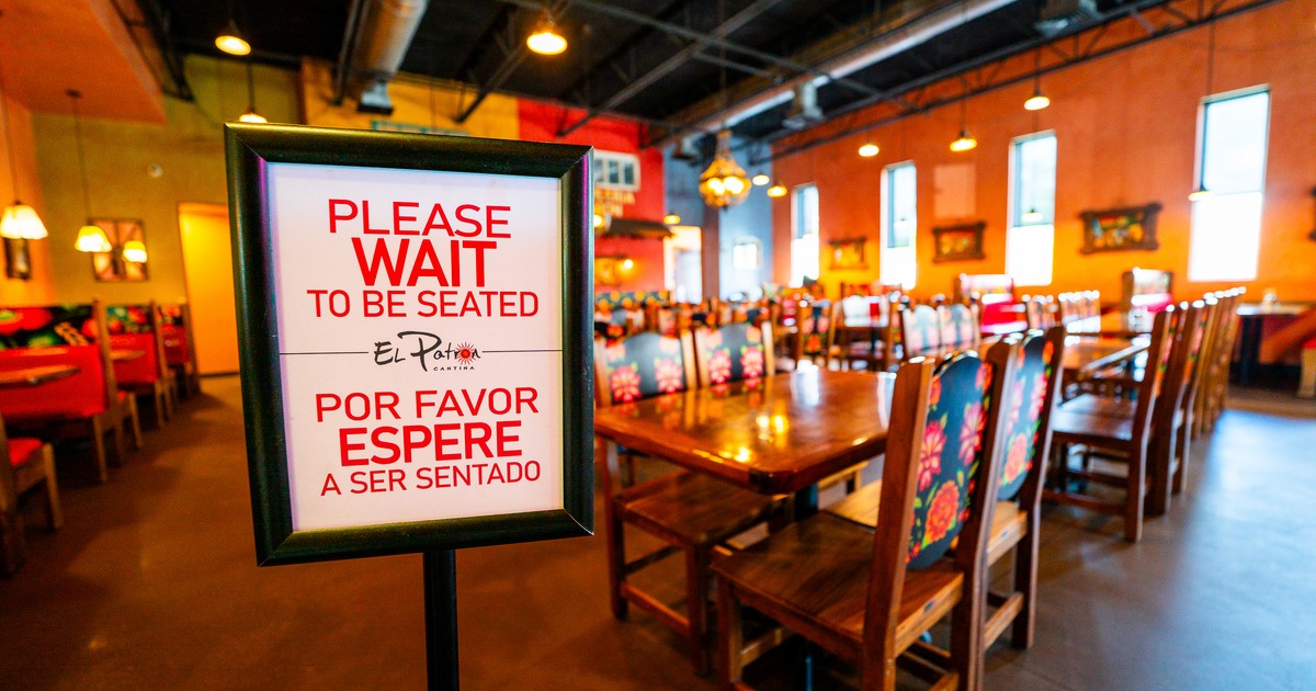 Diner area, tables, chairs, info table in front