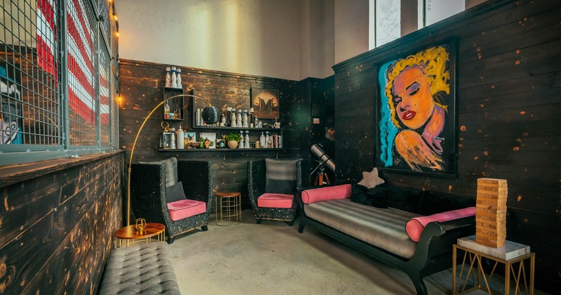 Seating area with sofa, tables and armchairs