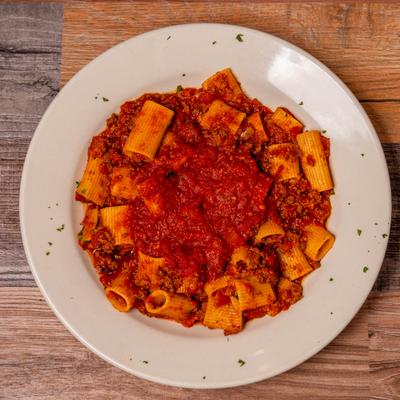 A classic rigatoni pasta served with a hearty meat bolognese sauce.