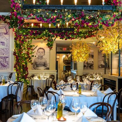 Interior, dining area, fully set tables.