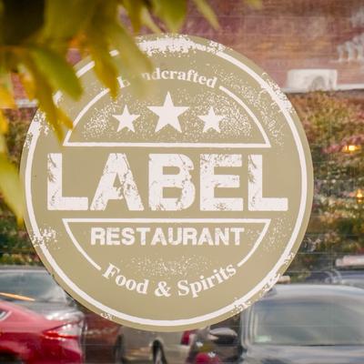 The restaurant's name on the window.