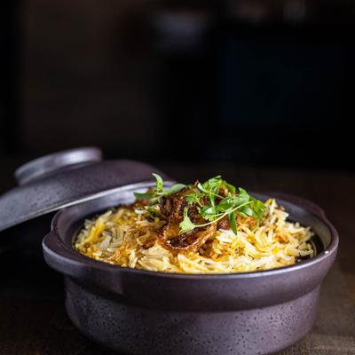 Traditional dish with fried rice and lamb