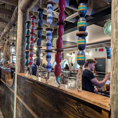 A person working the bar.