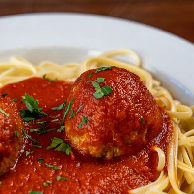 Spaghetti with meatballs, close-up.