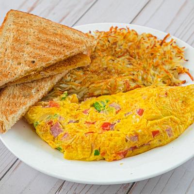 Denver omelet served with hash browns and toast.