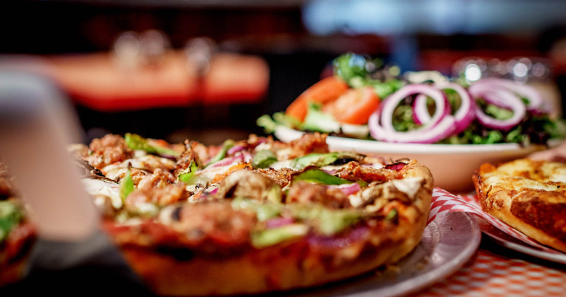 Deluxe Combo Pizza and Greek Salad