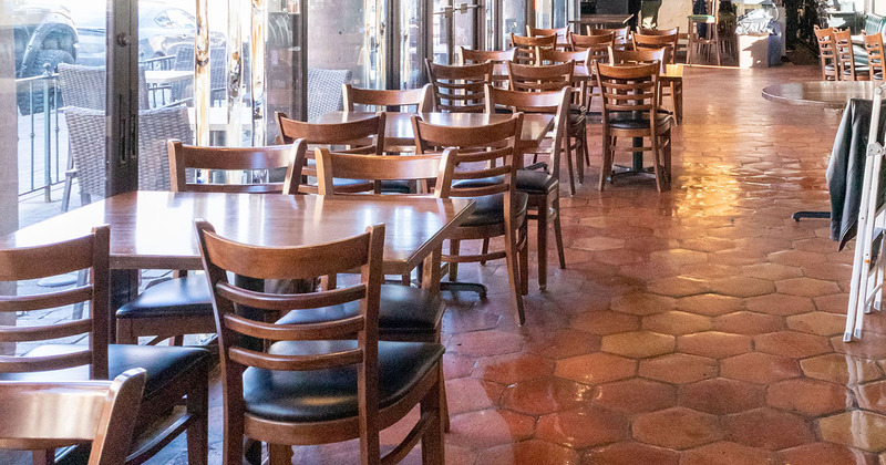 Interior, tables and chairs ready for guests