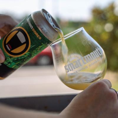 Pouring a glass of Savage Mondo beer.