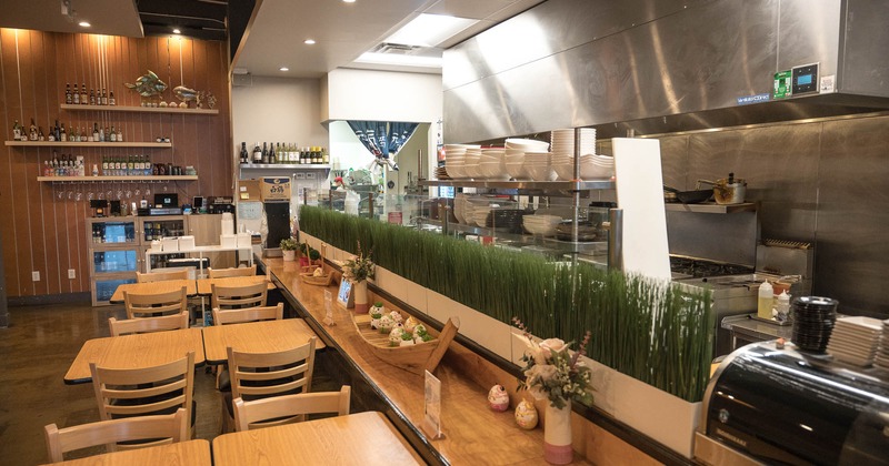 Interior, tables and chair near kitchen