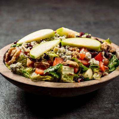Asian Salad, with romaine, mandarins, candied ginger, bean sprouts, tomato, onion, and noodles.