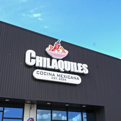 Resaturant outdoor sign above the entrance.