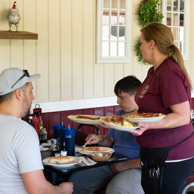 Guests being served food.