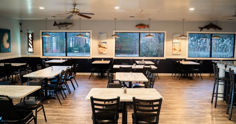 Interior, seating area with tables and chairs